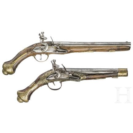 Two Oriental flintlock pistols, probably from the 