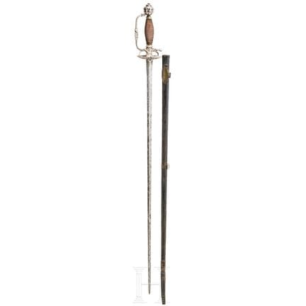 Une petite épée italienne à monture en argent, ver