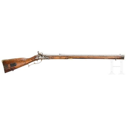 A German flintlock rifle, mid 18th century  
Oktag