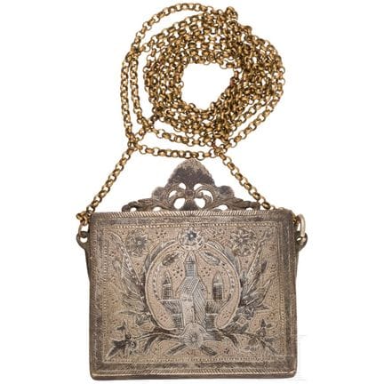 An Ottoman silver nielloed cartridge case, dated 1