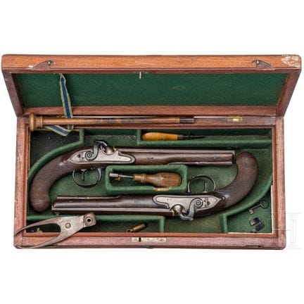 A cased pair of percussion pistols by Barber in Ne
