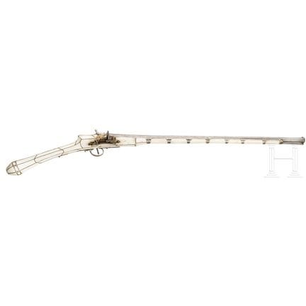 A Moroccan silver-mounted miquelet-lock rifle, cir