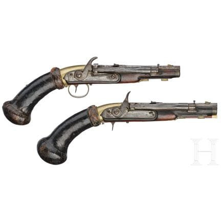 Une remarquable paire de pistolets à air comprimé,
