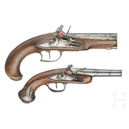 An English and a French flintlock traveling pistol