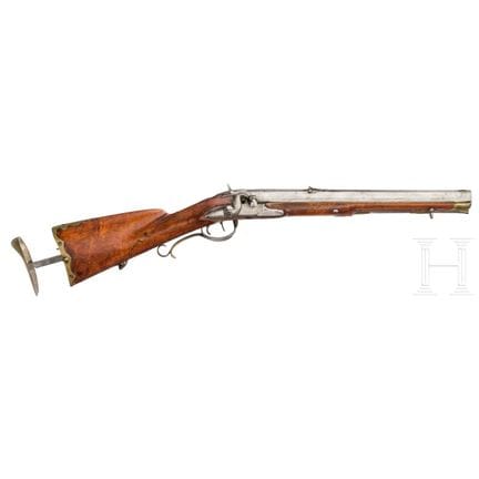 A converted percussion carbine with extendable but