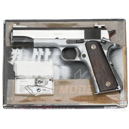 Un Colt Mod. 1911 A 1  
Calibre .45 Auto, n° 77903