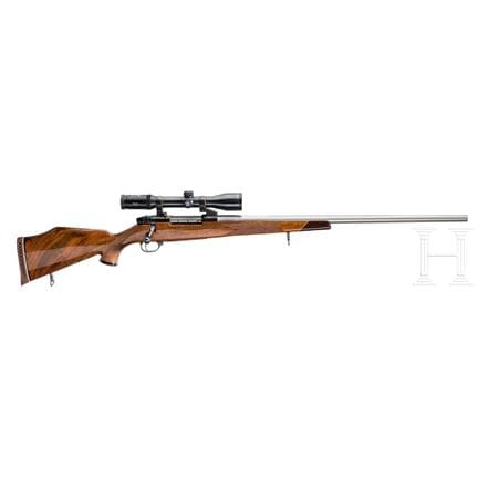 一把配备瞄准镜的Weatherby Mark V型步枪  
口径 .340WeathMag，编号 H