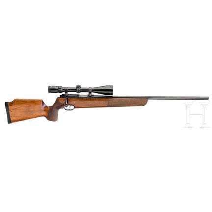 一把瓦尔特KJS型手枪，配布什内尔瞄准镜  
口径.22霍内特，编号2850，光面比赛枪管，长65厘