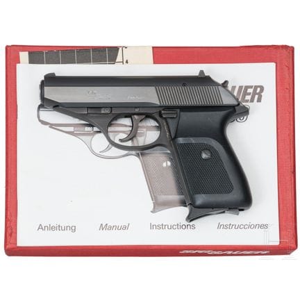 Un SIG Sauer Mod. P230, dans sa boîte  
Calibre 9x