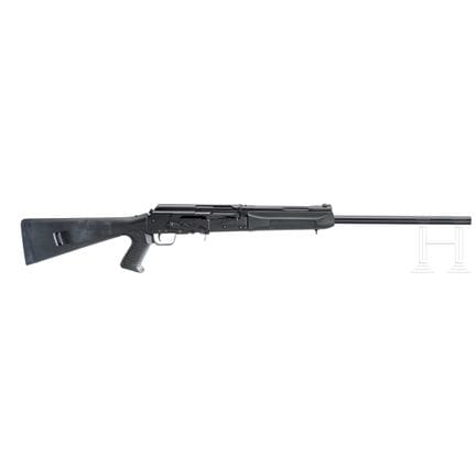 A Saiga-12 半自动霰弹枪  
口径 12/70，编号 00402715，枪管光亮，需清洁。