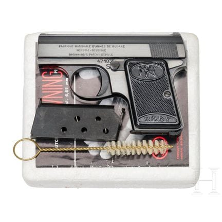 FN Mod. Baby，原厂包装  
口径 6.35 毫米 Browning，编号 471035，