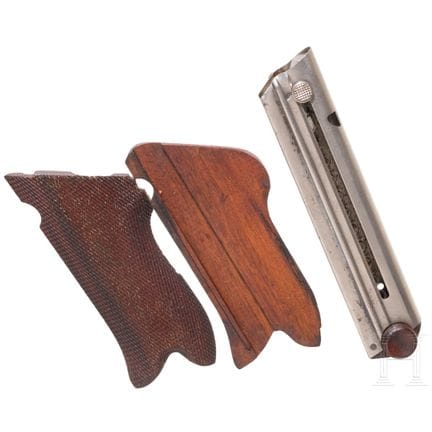 Crosse et chargeur pour un Parabellum 1906  
Cosse