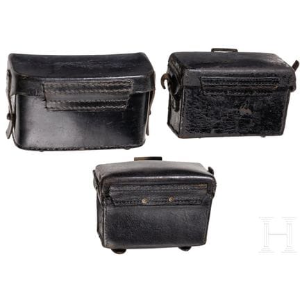 Dos cartucheras de infantería M95 y cartuchera méd