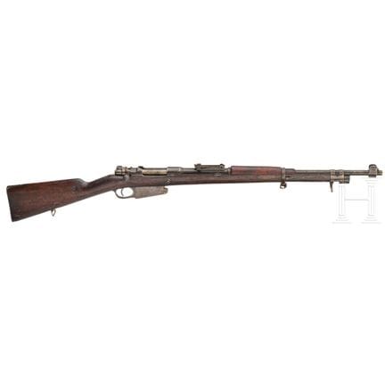 Una Pieper, modelo 1889/36  
Calibre 7,65x73DWM, n