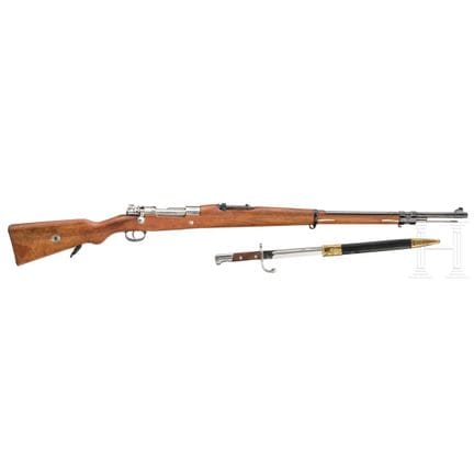 Un DWM Mod. 1908  
Calibre 7x57, n.º 124Nn, con el