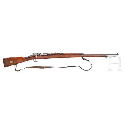 Un rifle Mauser Mod. 1896  
Calibre 6,5x55 sueco, 