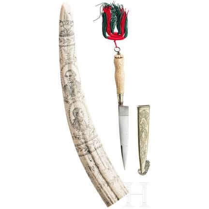 Walrus tusk collector's item and gaucho knife  
Ku