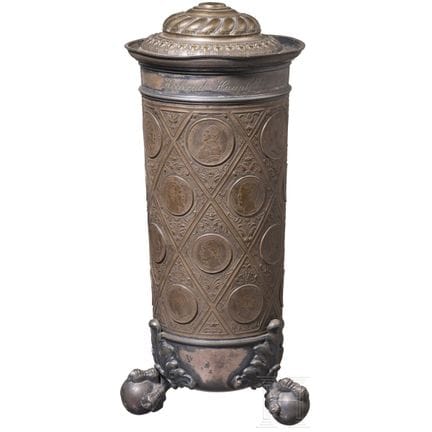 A large coin cup awarded as a prize in a high-whee
