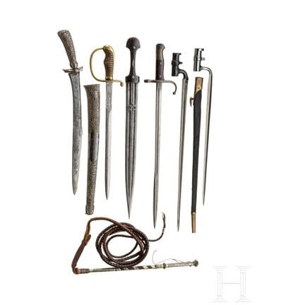 A small collection of edged weapons and a whip  
B