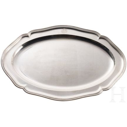 A large silver serving platter from the tableware 