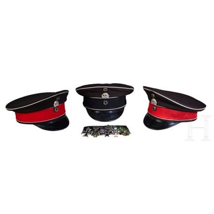 A medal bar and three skull-and-crossbones caps, r