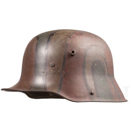 A steel helmet M 1916/17 with camouflage paint  
F