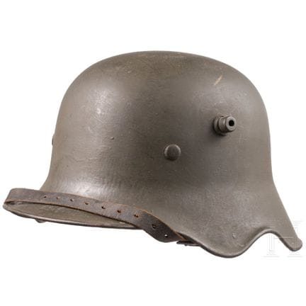 A steel helmet M 18 with ear cut-out  
Stahl, gebö