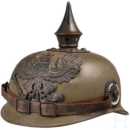 A steel-plate ersatz helmet, circa 1914  
Glocke a