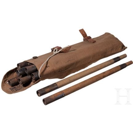 Twelve tent poles in stamped bag  
Zwölf zusammens