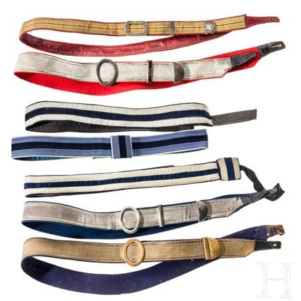 A collection of cartouche box bandoliers and waist