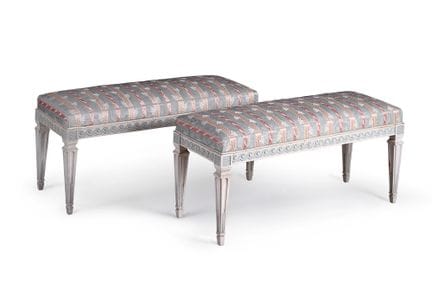 Pair of carved, molded wooden benches, lacquered g