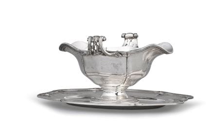 Une saucière en argent 800°° composé d'une coupe p