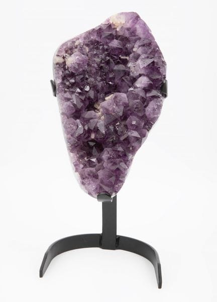 Large amethyst stone.

On metal stand.

Measuremen