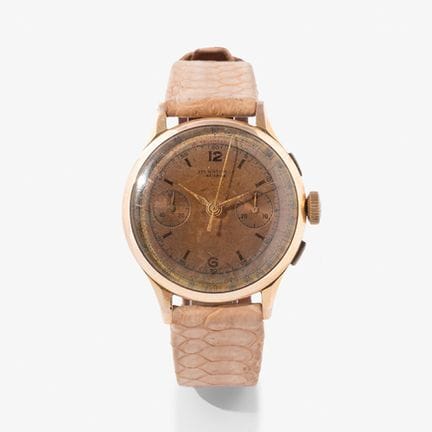 IPI WATCH。18K金计时腕表。瑞士，1950年代。

圆形18K黄金表壳，带有印记，配以风格