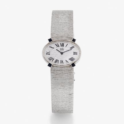 Reloj A. y J. Torres.

De oro blanco.

Esfera blan