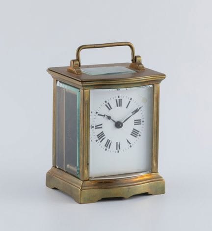 Carriage clock. France, early 20th century.

Brass