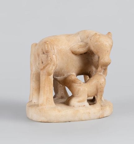 Cow and calf; Agra, India, 18th century.

Carved m