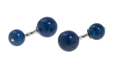 A pair of cufflinks made of 18-karat white gold.


