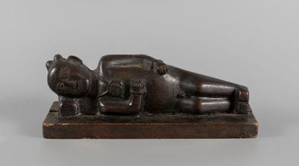 Chinese figurine, 19th century.

Carved wood.

Mea