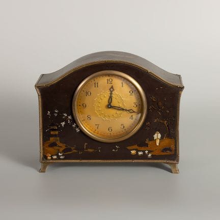 Table clock with Chinese-style ornamentation. Late