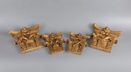Set of four Corinthian capitals; 18th century. 

C