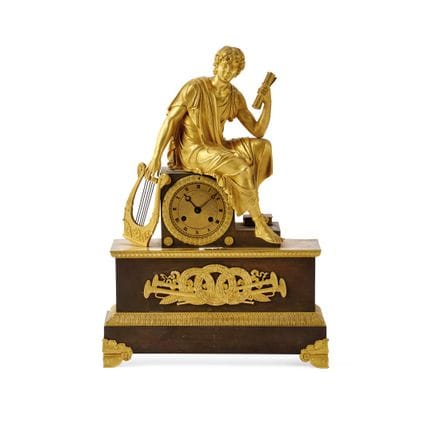 FRENCH CLOCK, approximately 1830 - Case in gilded 