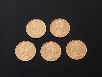 Cinq pièces de 20 francs suisses en or 900 millièm