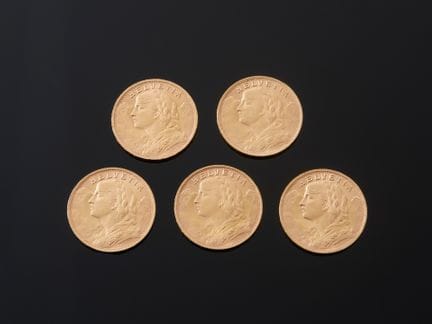 Cinq pièces de 20 francs suisses en or 900 millièm