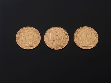 Trois pièces de 20 francs en or 900 millièmes au G