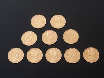 Dix pièces de 20 francs suisses en or 900 millième