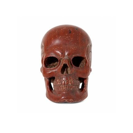 174. Teschio in marmo rosso antico
cm. 18x17x11 ci