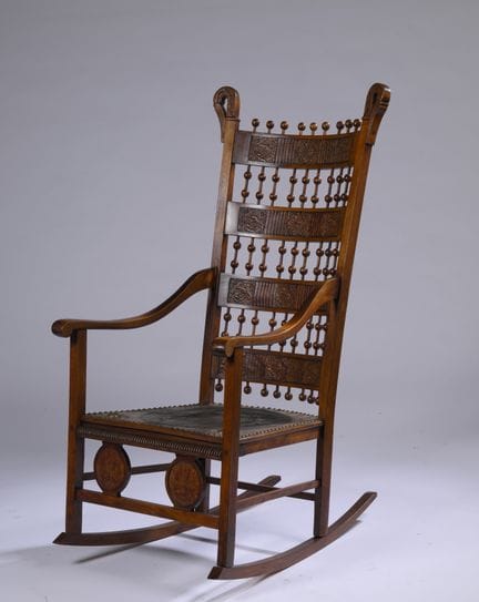 ARTS  CRAFTS
Rocking chair with a high, sloping ba