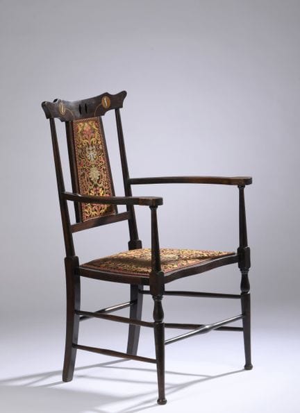 VIENNESE WORK, 1900
Mahogany armchair with a high 