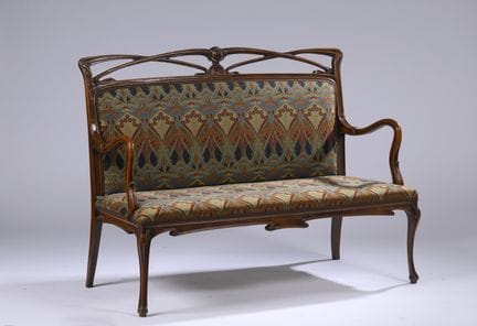 FOREIGN WORK, 1900 
Two-seater sofa in molded, car